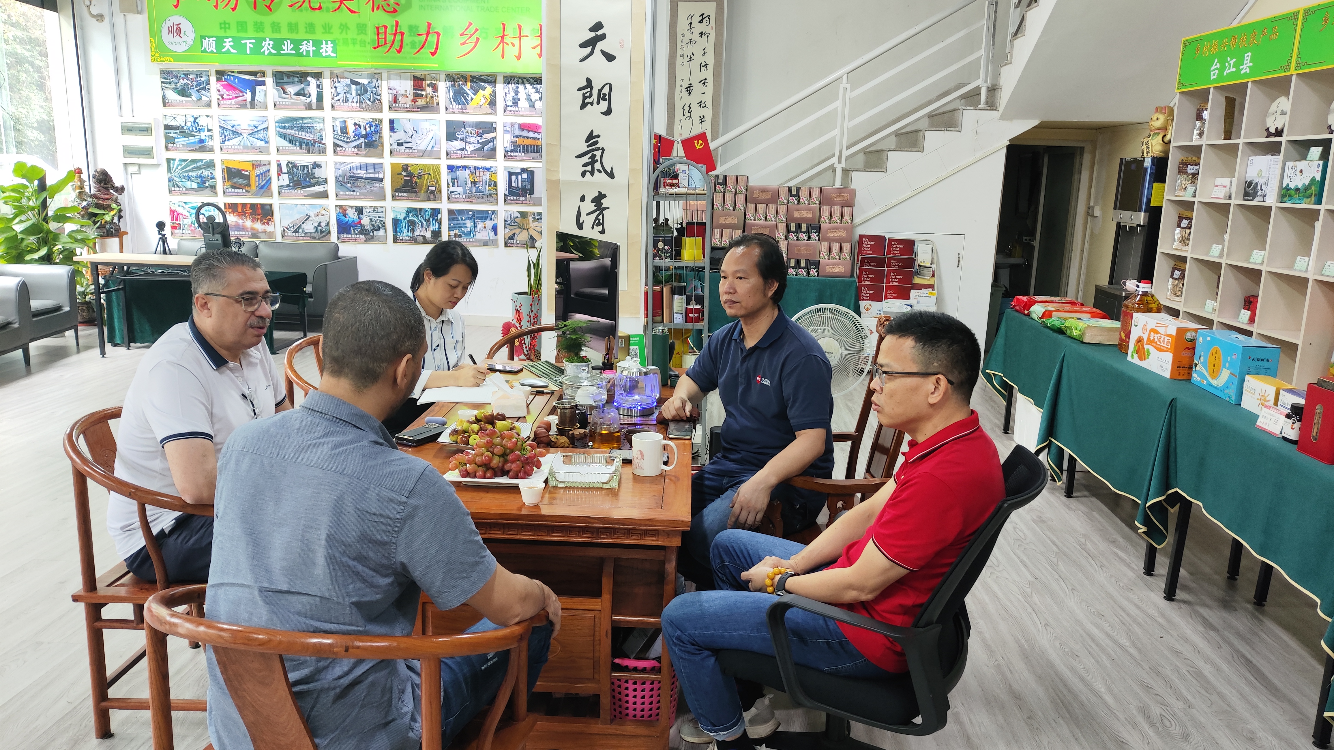 Technical engineers and clients reviewing equipment specifications during inspection