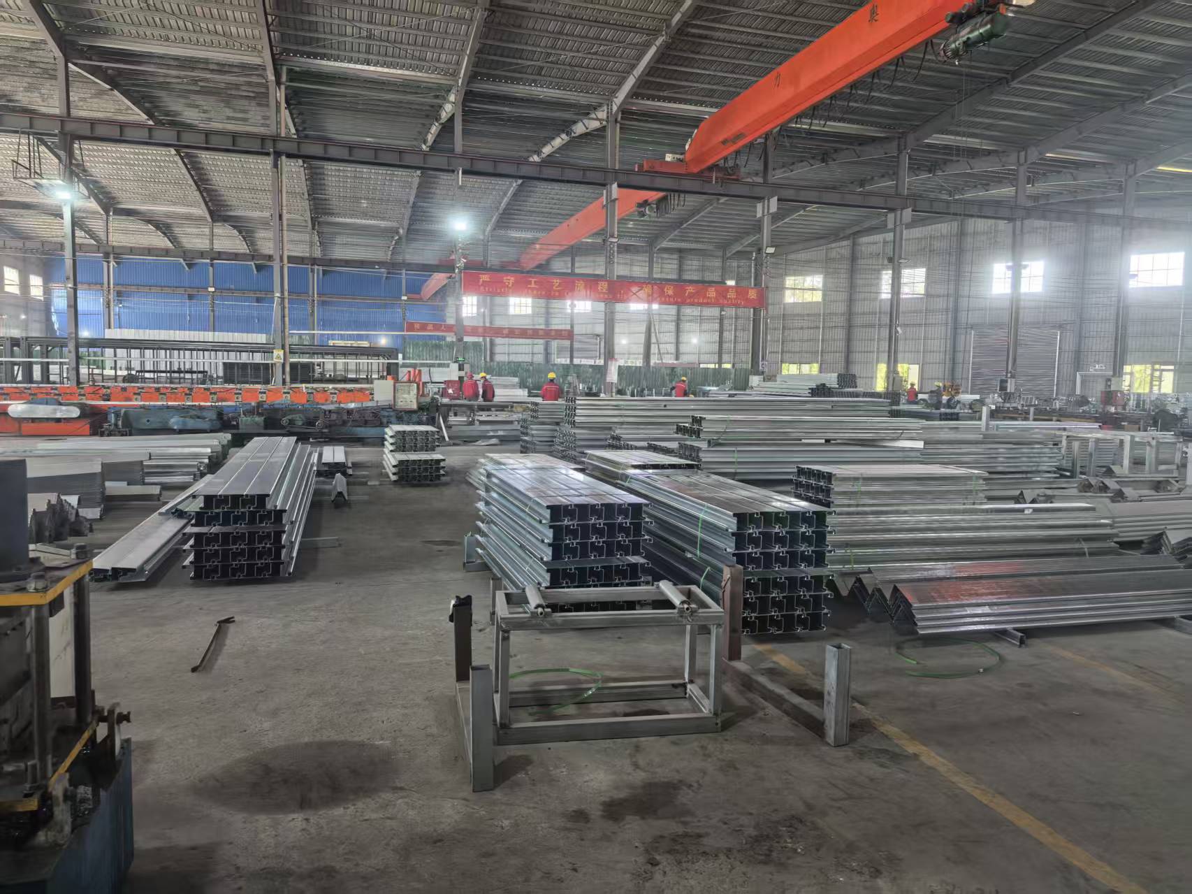 Factory assembly line for modular and expandable container houses