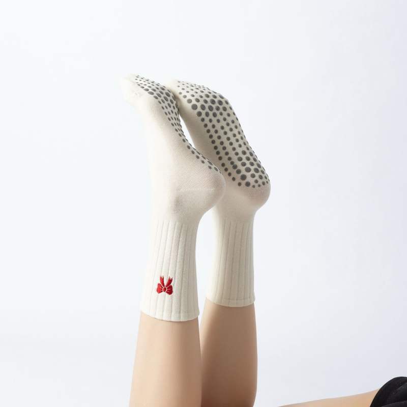 Custom Pilates grip socks with ribbed knit construction