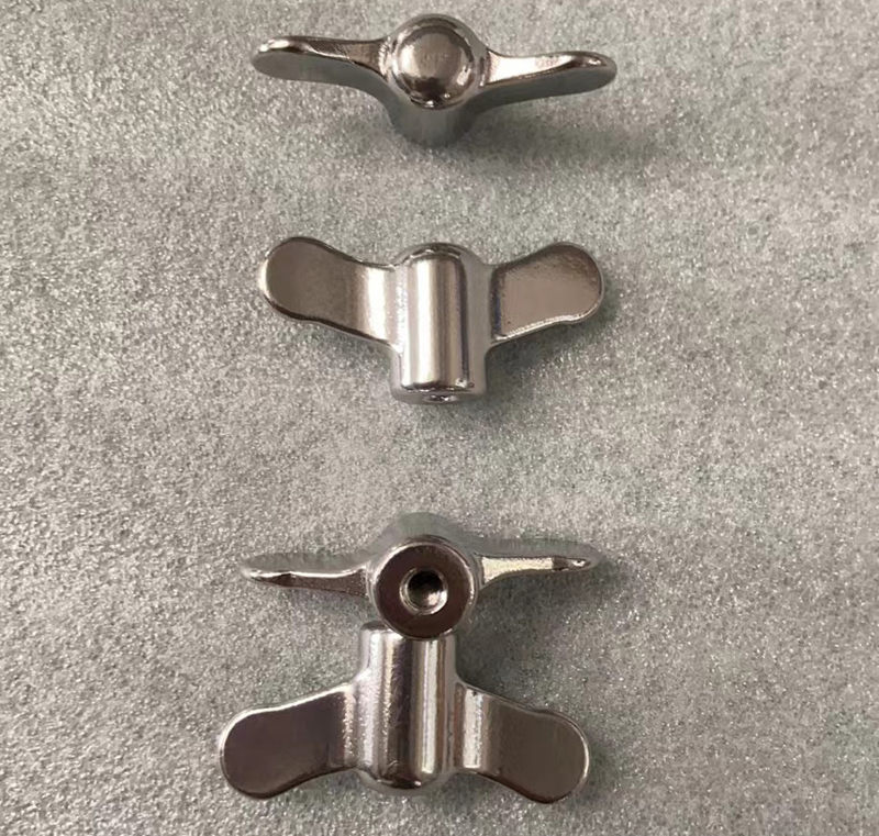 Industrial wing knobs and clamping knobs with stainless steel threaded studs for heavy machinery adjustment