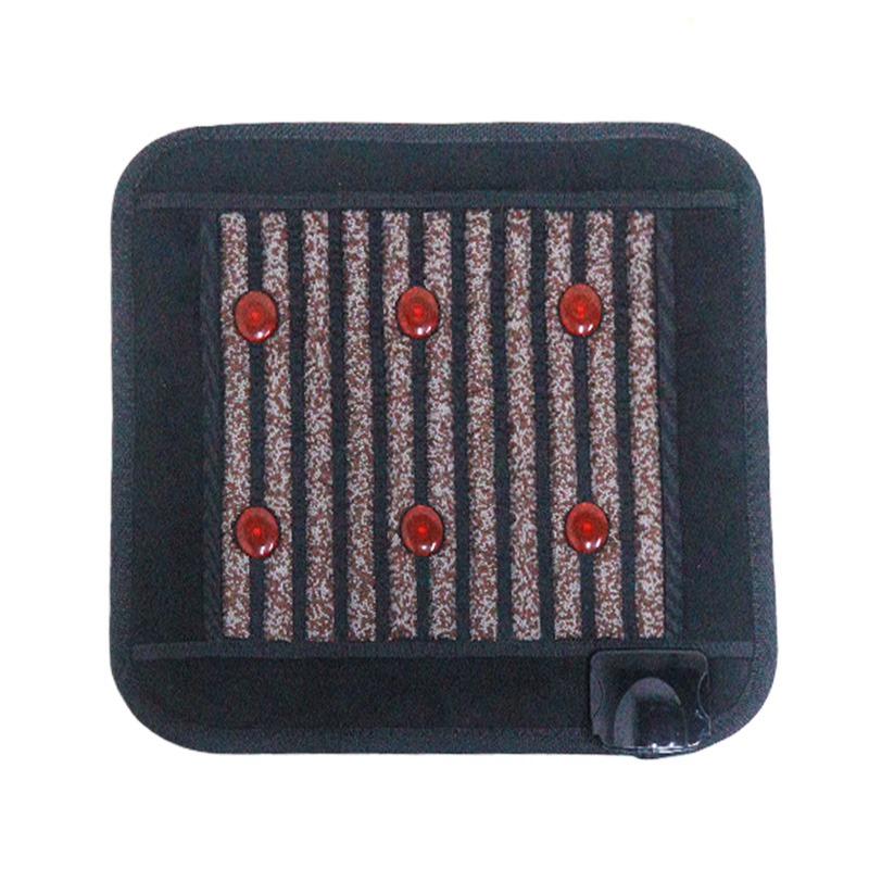 Handheld controller and connection ports of the Photon Lights cushion heating mat