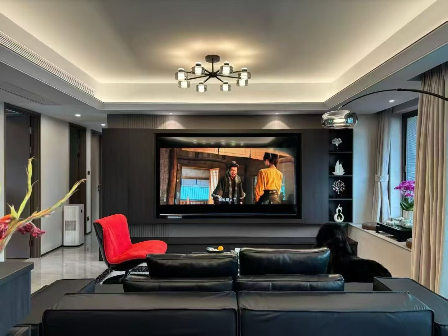Interior design layout featuring customized TV cabinet and integrated storage units