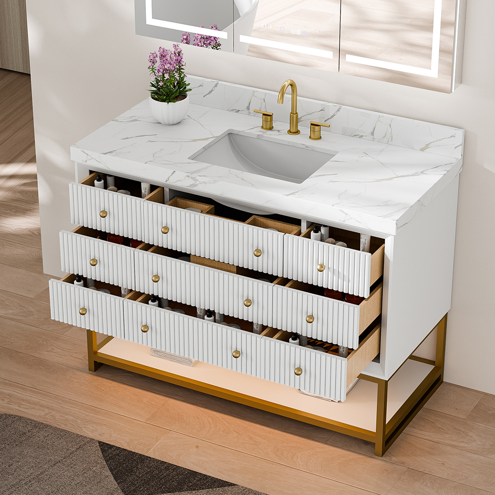 Freestanding bathroom vanity with porcelain undermount sink and marble top
