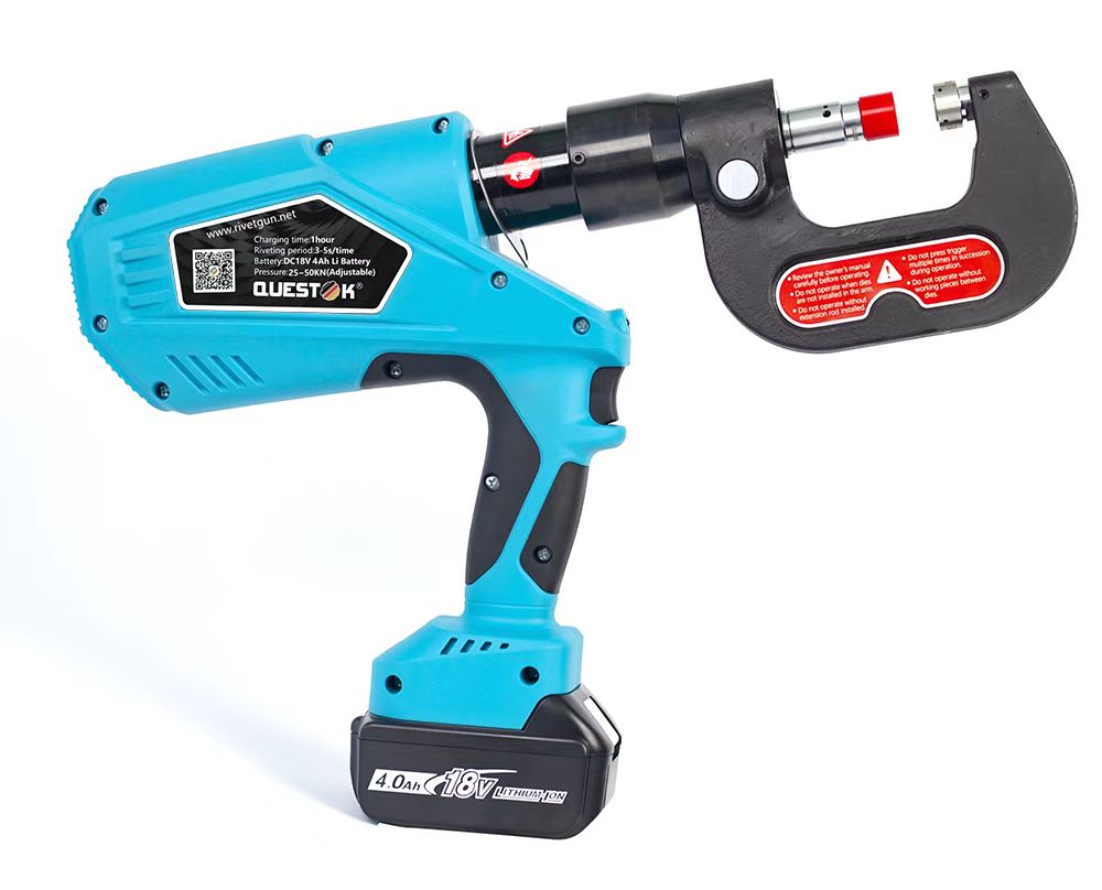 Questok cordless portable clinching gun for cold storage door showing robust hydraulic head and battery attachment