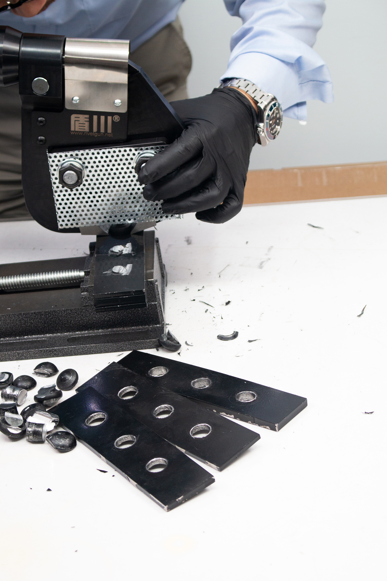Cleaning truck solid steel rivet remover tool in action