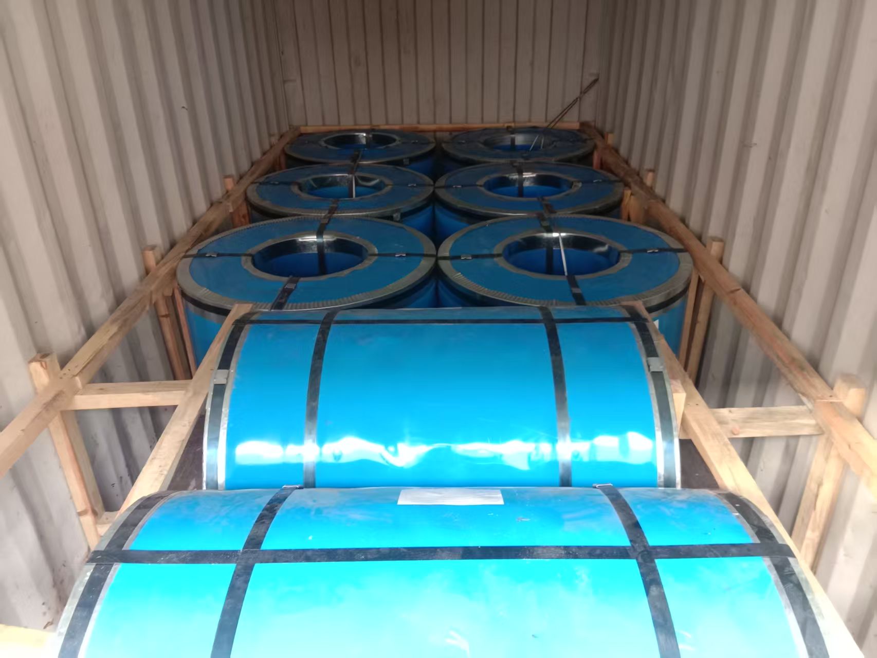Close-up of cold rolled stainless steel coils ready for packaging and shipping