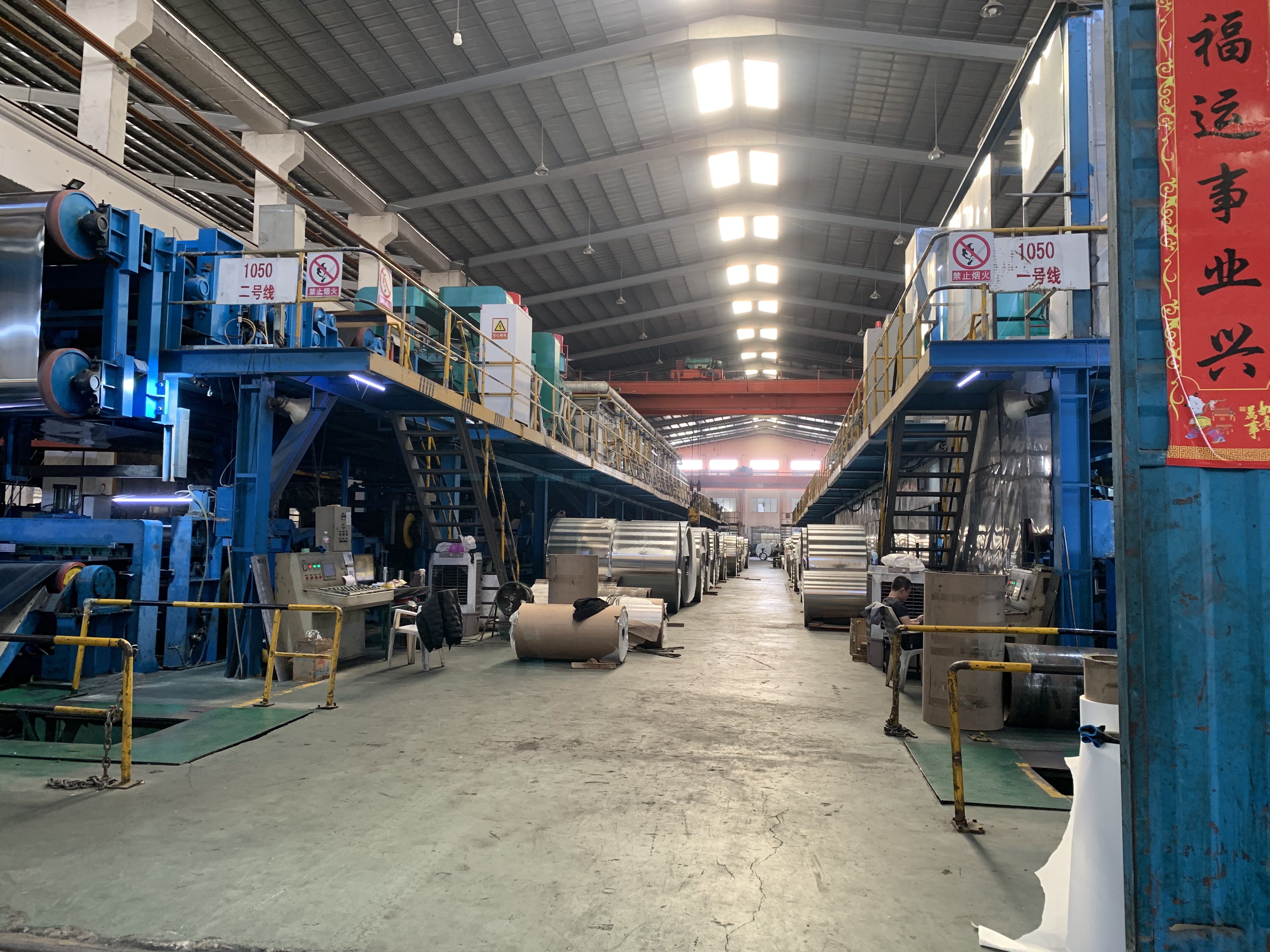 Cold rolled stainless steel coils in a warehouse ready for global distribution