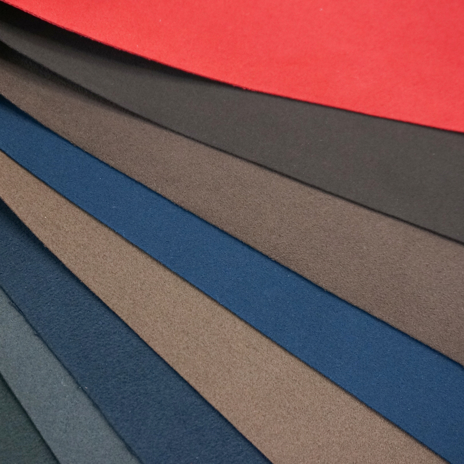 Automotive interior microfiber leather undergoing quality inspection