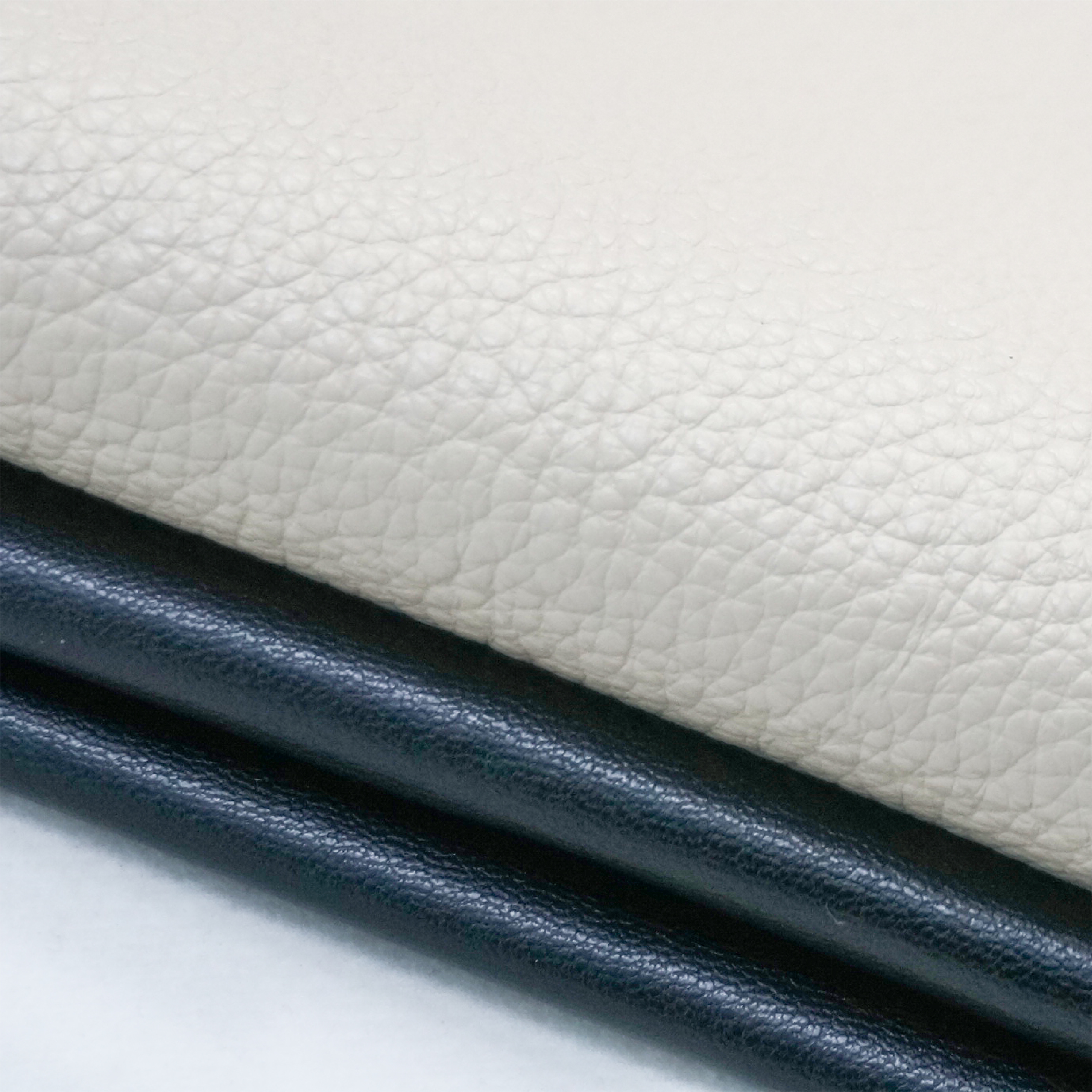 Microfiber synthetic leather backing and edge structure demonstrating peeling resistance