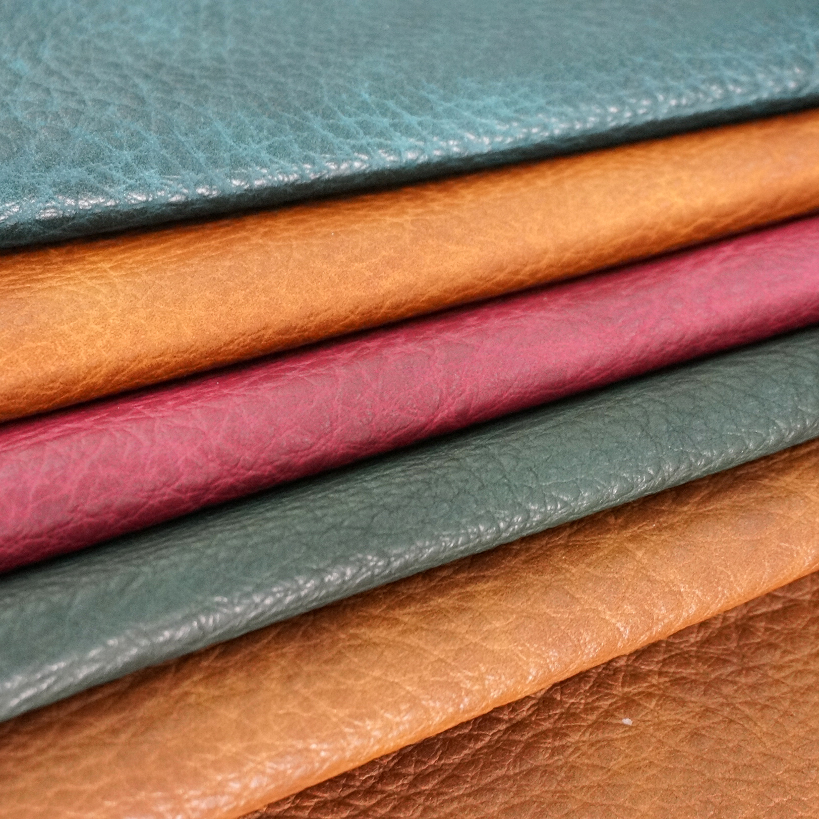 Comparison of different textured synthetic leather swatches for sofas