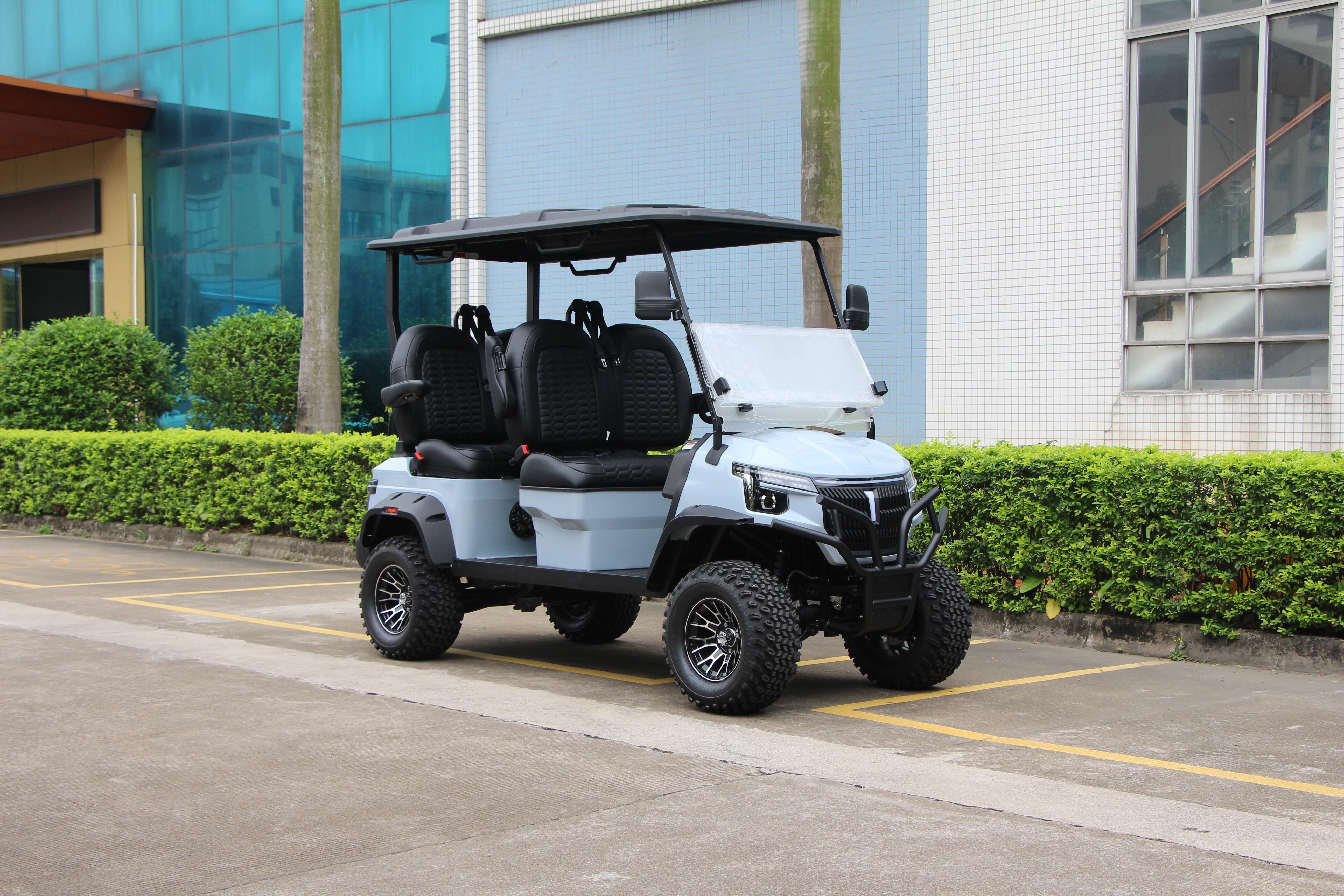 Electric golf cart interior with microfiber leather seating and digital instrument dashboard