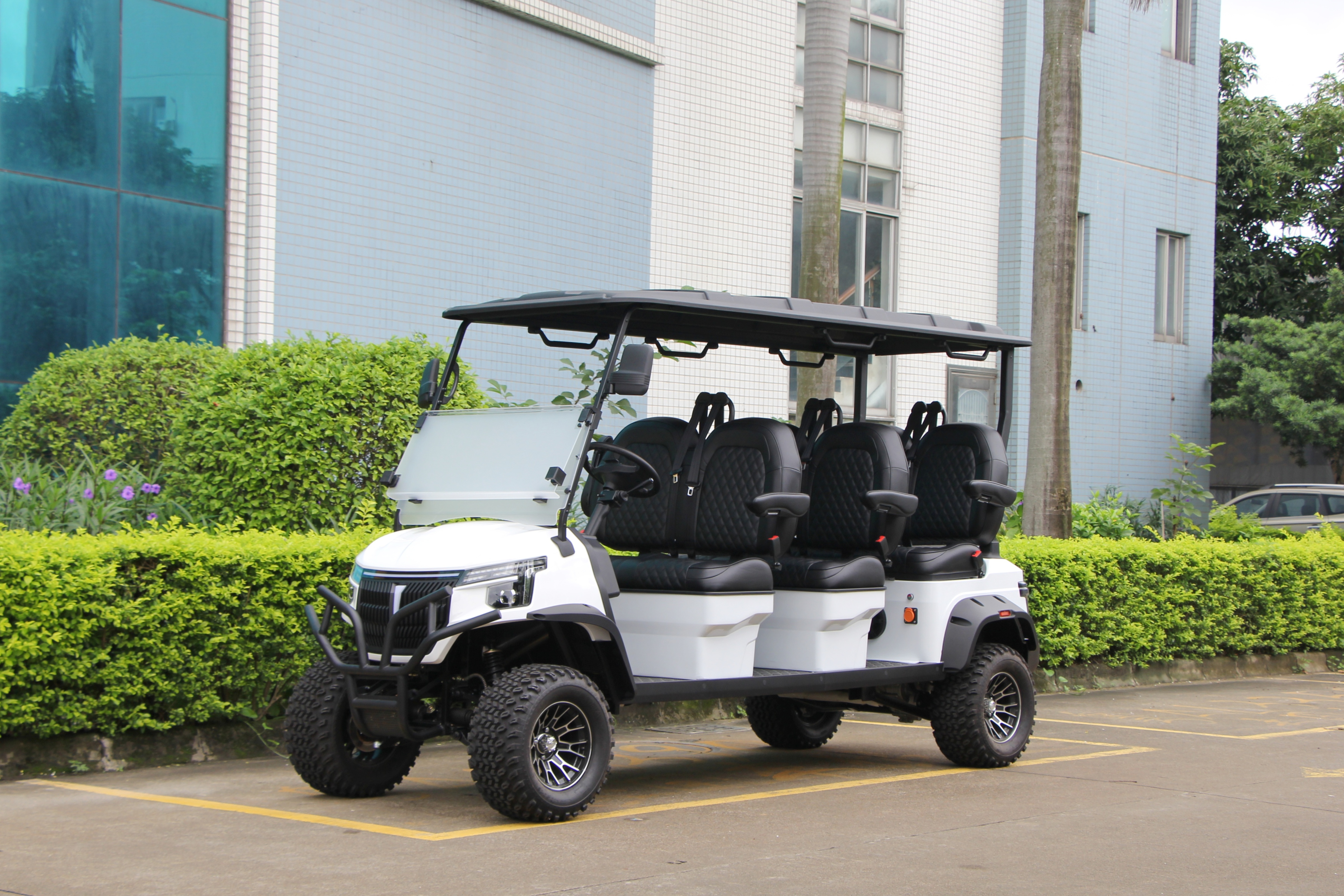Modern interior of electric golf cart with digital display and ergonomic seating