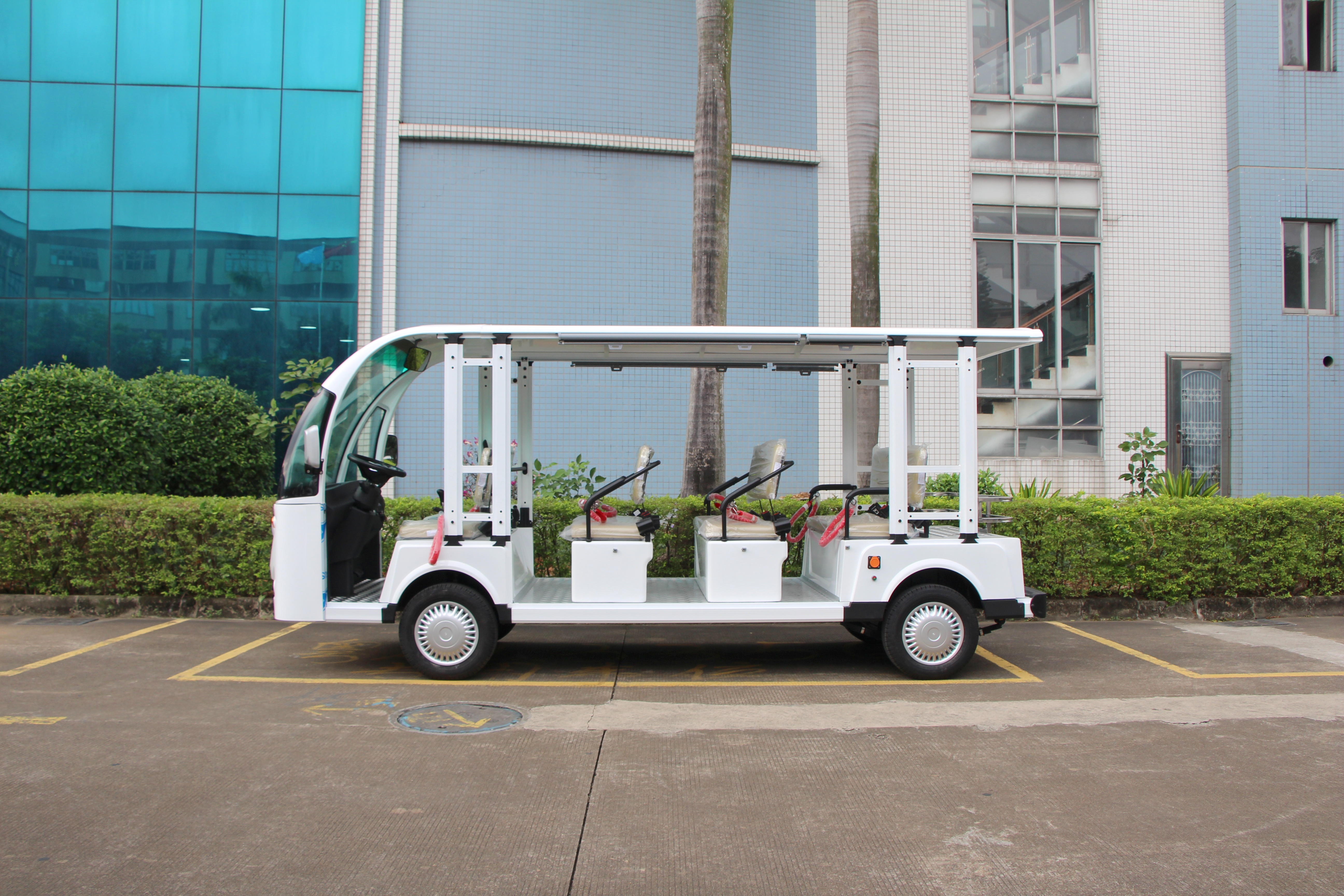 Side view of 11seats electric sightseeing bus for resort shuttle services