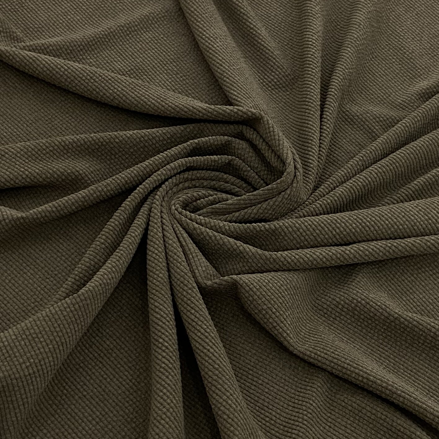 Corduroy fabric with longitudinal raised ribs for commercial applications