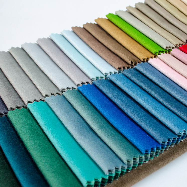 High-quality Holland velvet fabric showing its soft hand feel and full pile surface