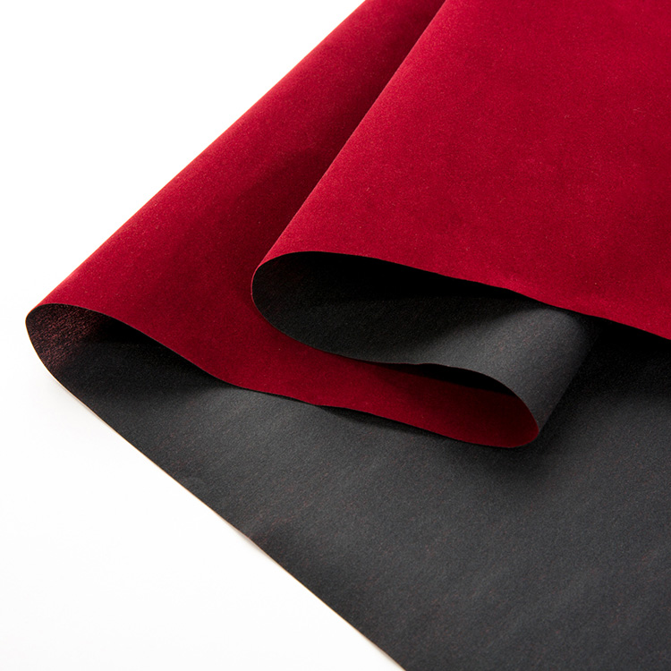 Nonwoven Flocking Fabric rolls showing uniform pile density and backing structure
