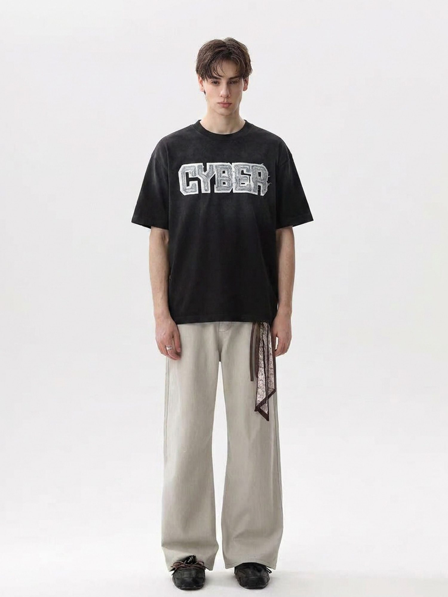 Acid-wash printed T-shirt detail for custom streetwear development