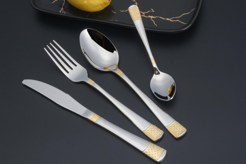 Embossed gold plated cutlery with PVD finish