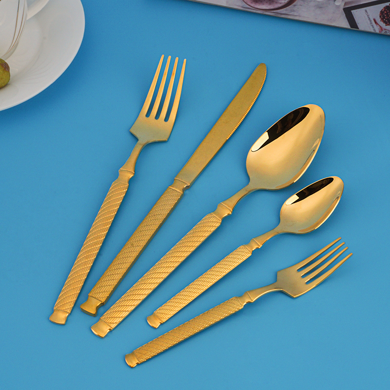 Colorful handle spoons showing woven texture and metal color accents