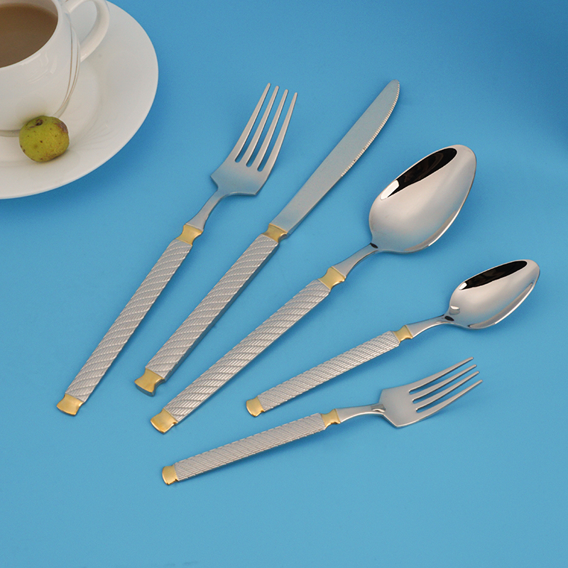 Woven handle flatware with colored titanium-plated handles